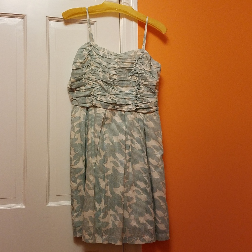 Flounce gathered bodice, pleated skirt dress